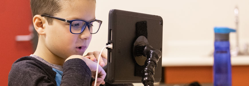 Student using an iPad during a lesson