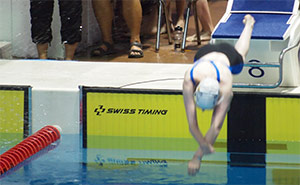 Holly diving into the pool