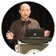 A man standing at a podium speaking